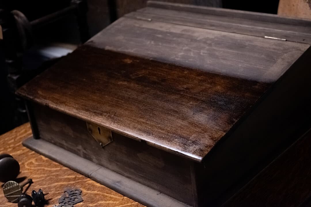 Antique chest transformation showing unfinished and finished surfaces